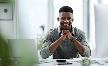 Picture of a man in front of a computer