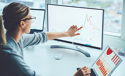 Picture of a woman in front of a computer