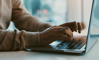 picture of someone using a laptop