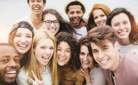 a group of young happy people 