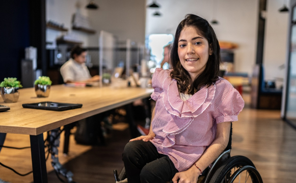 A woman in a wheelchair