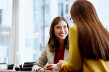 2 young ladies talking